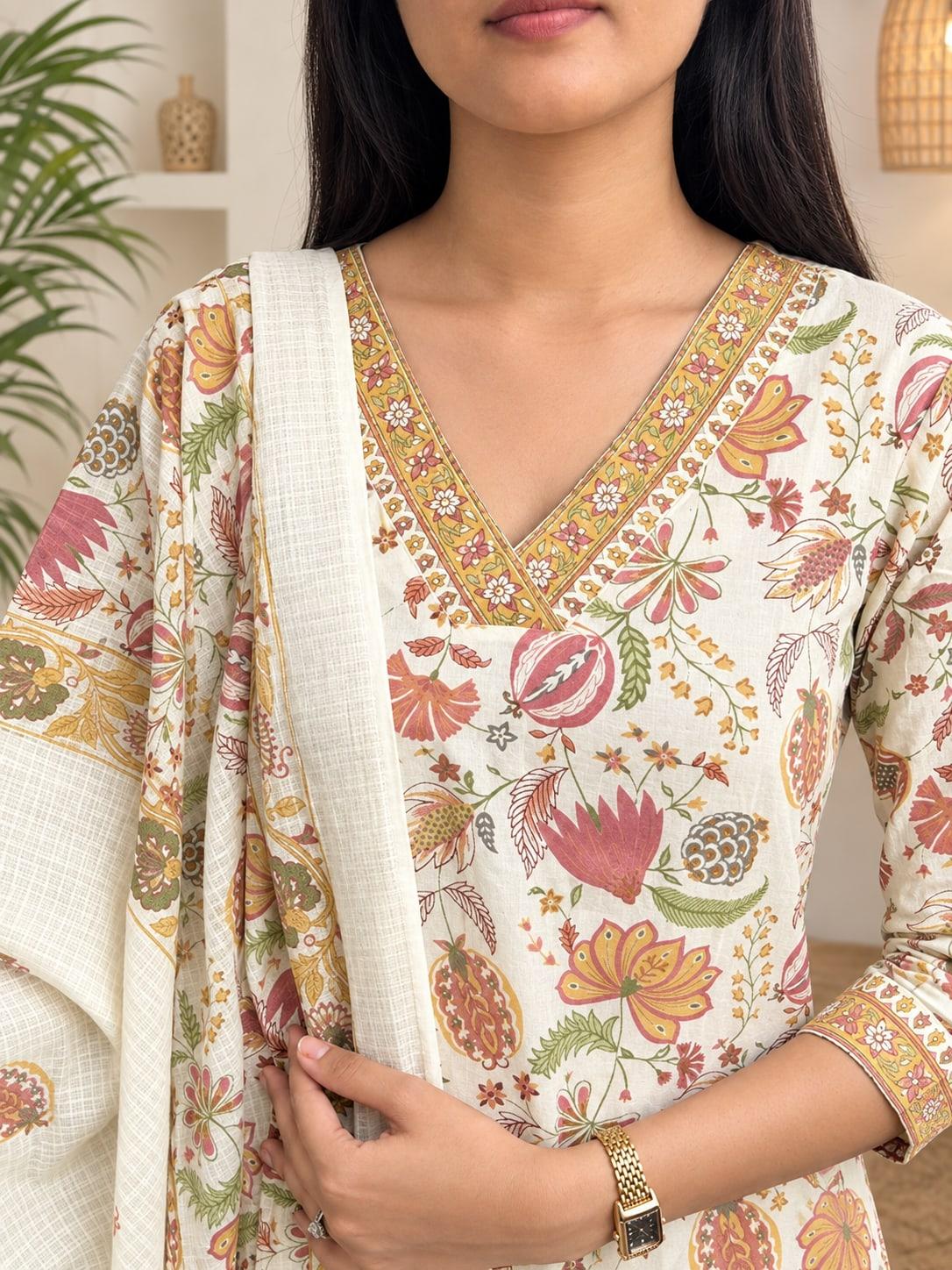 Cream floral jaal kurta V-neckline, mustard bordered band in detail