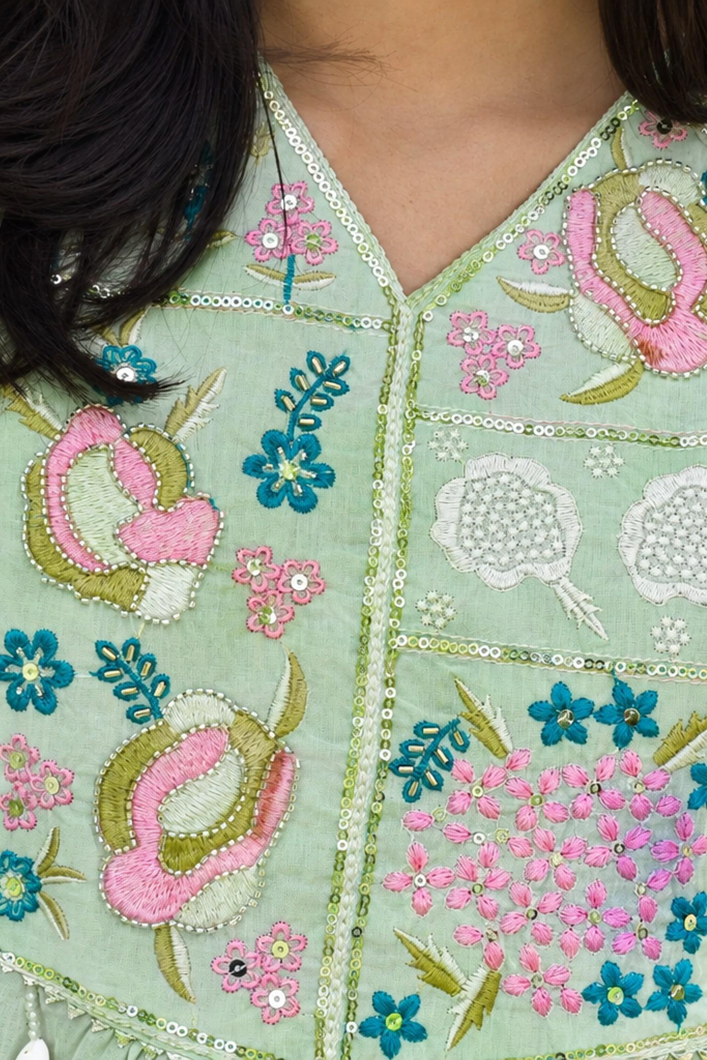 Mint pastel paisley yoke, floral embroidery and beadwork in close detail