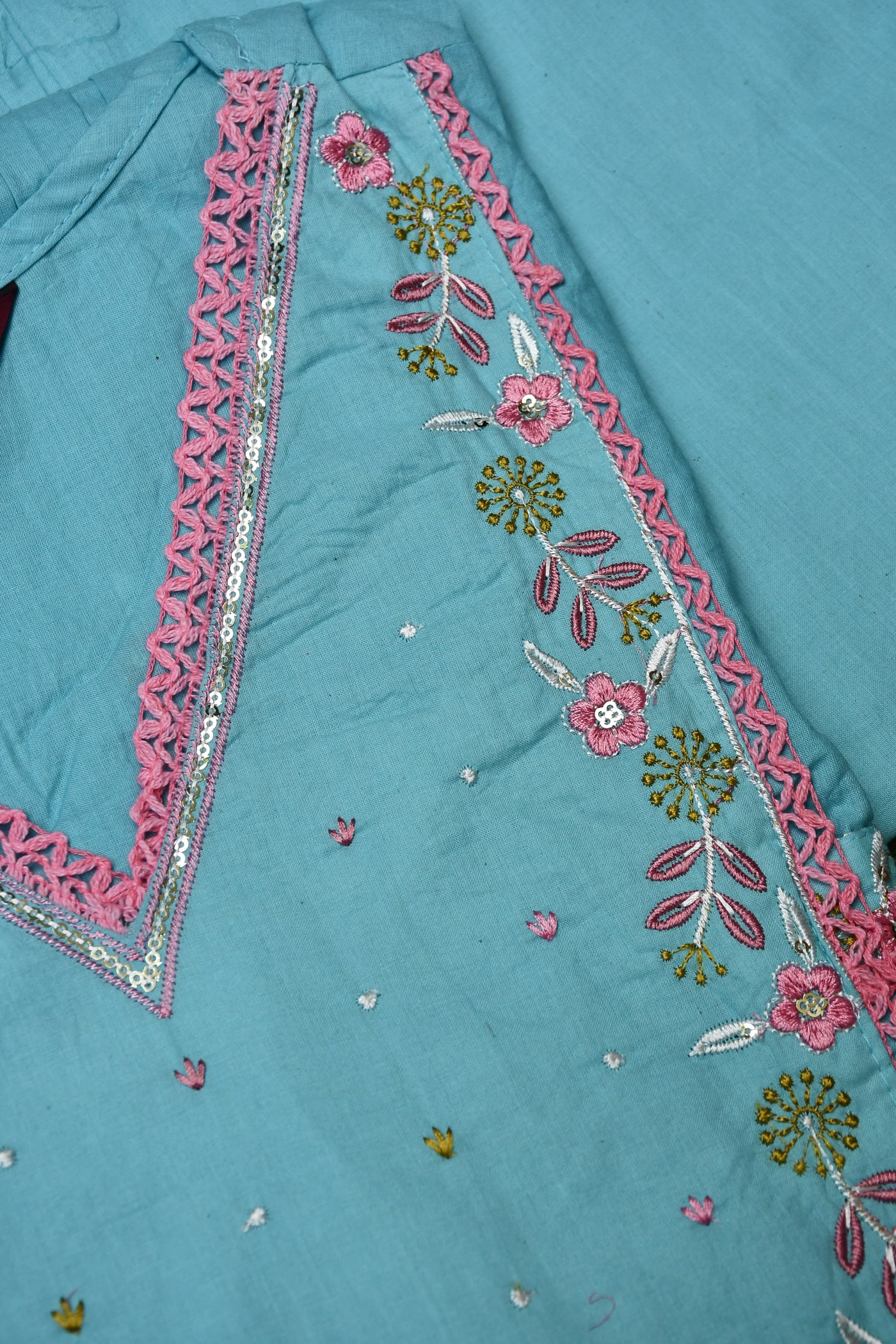 Sky Blue placket detail, pink braid and pastel flowers