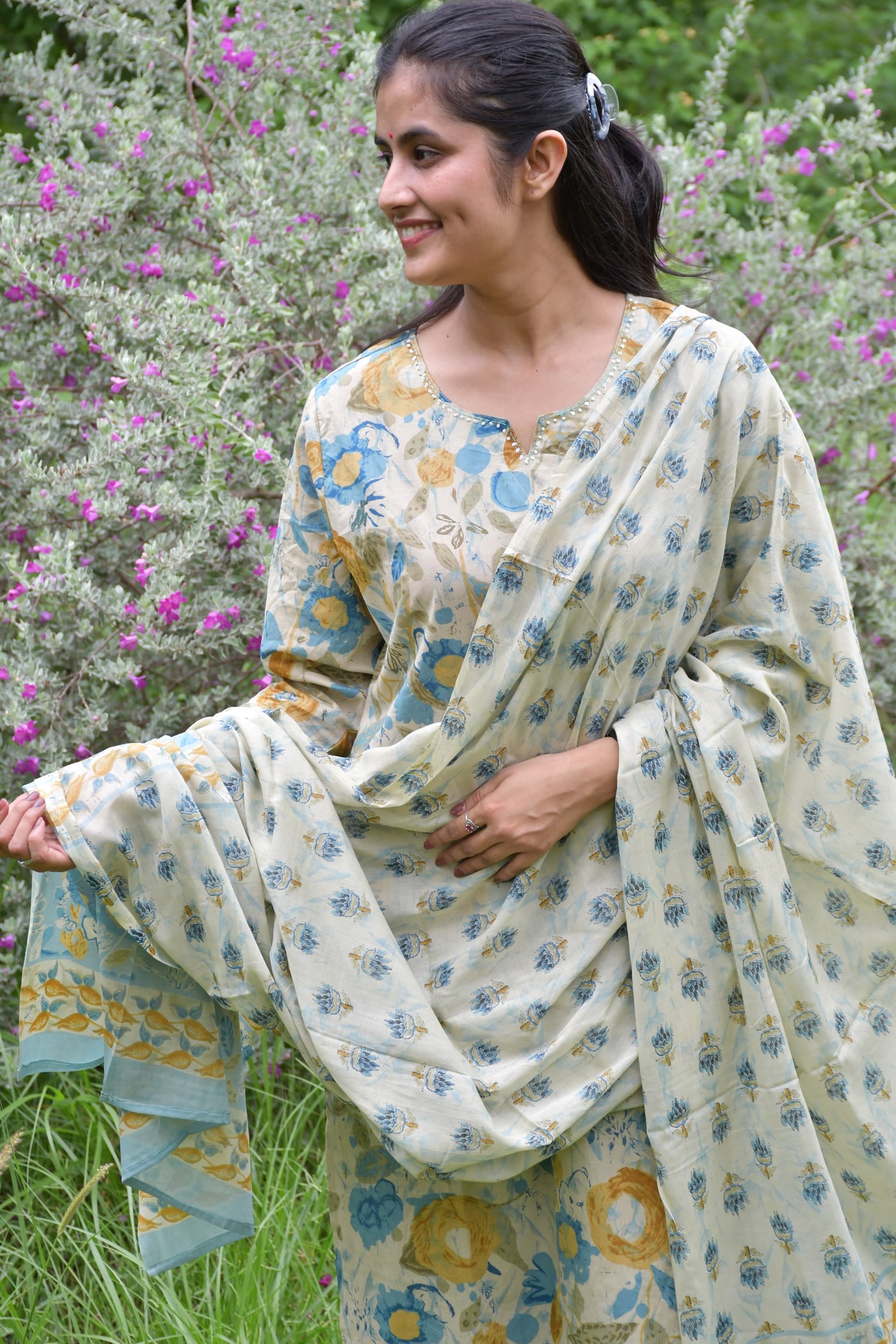 Ivory block print dupatta seen close, blue and mustard flowers