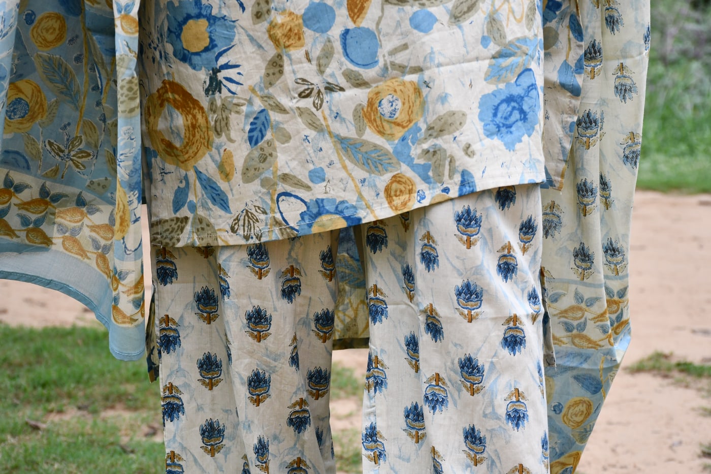 Ivory block print kurta hem meeting the printed pant