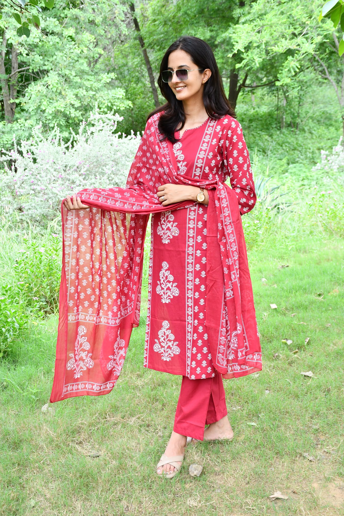Rani Pink block print kurta with the dupatta drawn across the front