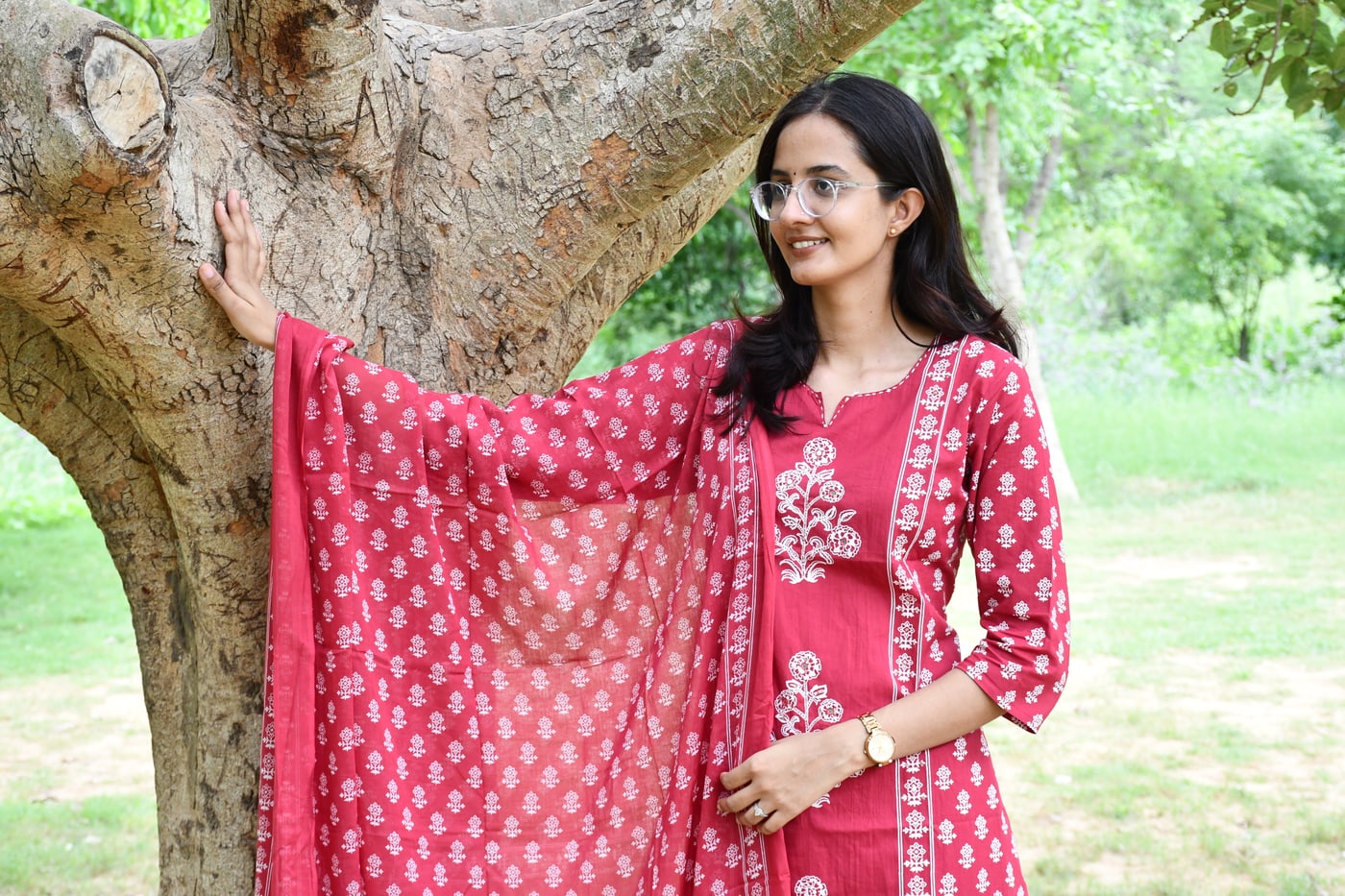Rani Pink block print dupatta held open against the light