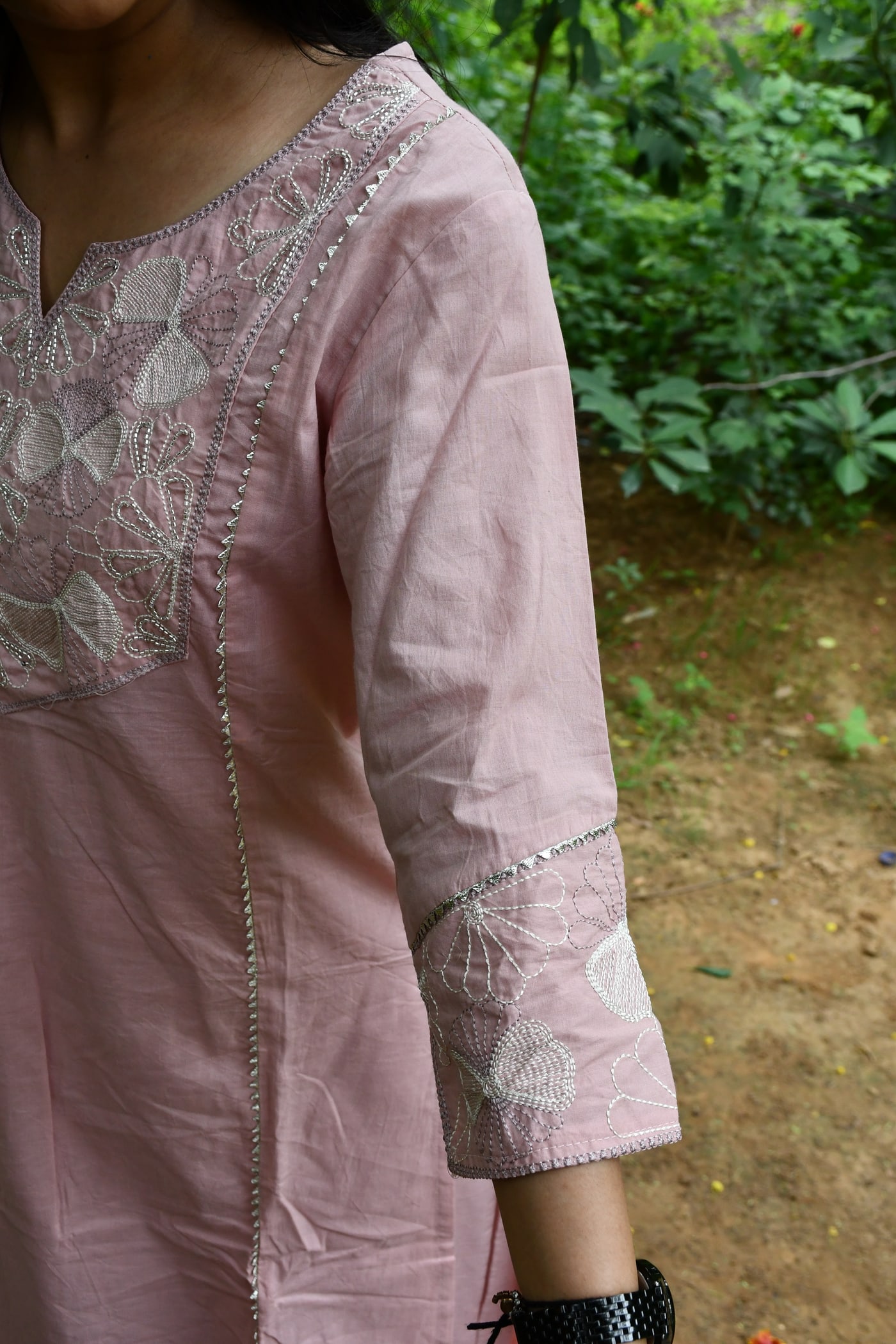 Dusty Rose kurta from the side, cutwork sleeve cuff in view