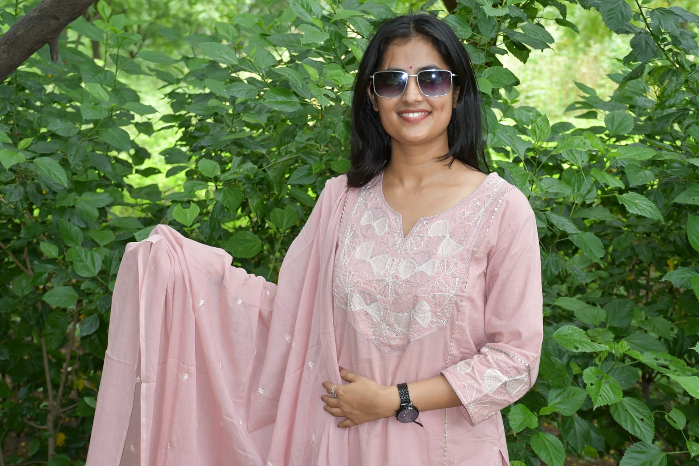 Dusty Rose suit set worn with the dupatta drawn across