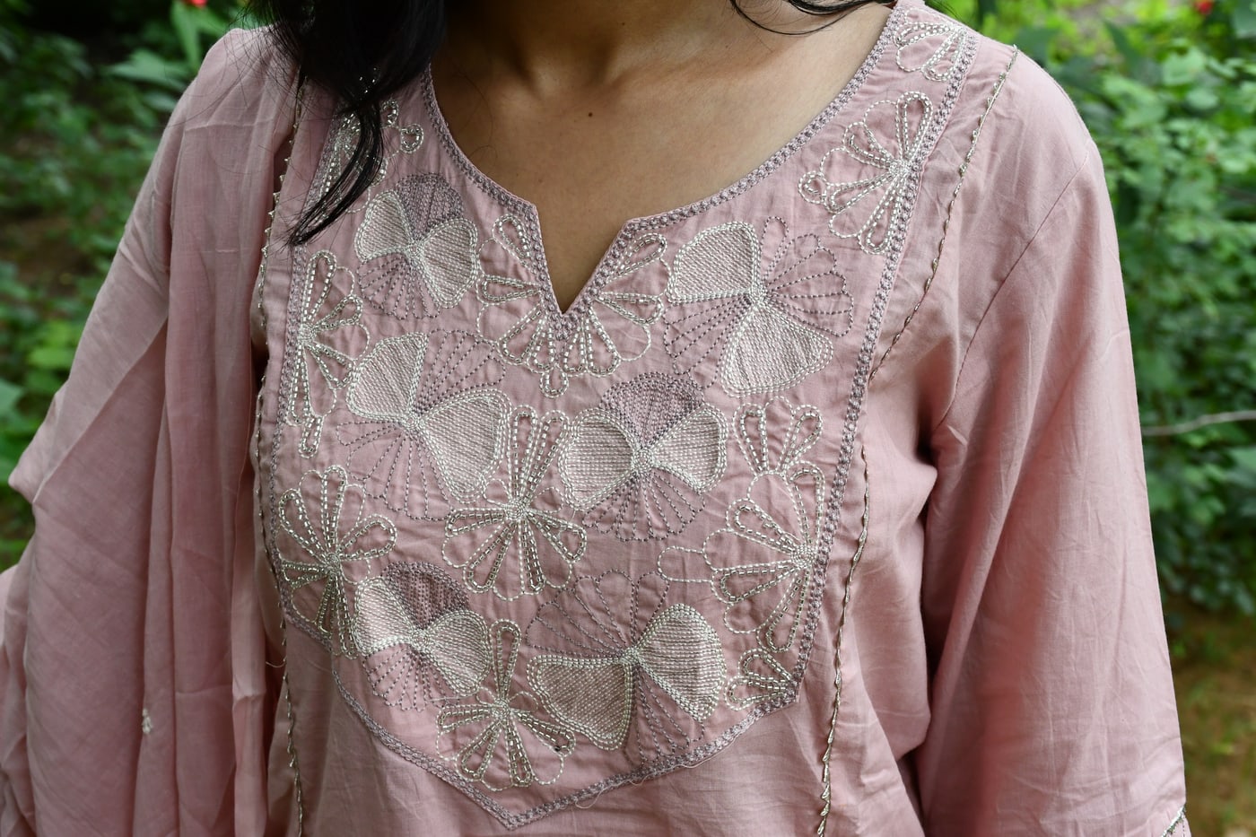 Dusty Rose neckline, tonal white cutwork in detail